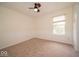 Bedroom featuring carpet floors, wainscotting, and natural light from the window at 5883 Sandalwood Dr, Carmel, IN 46033