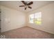 Bedroom with neutral walls, carpet floors, ceiling fan, and one window at 5883 Sandalwood Dr, Carmel, IN 46033