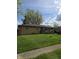 Beautiful single-story home featuring a well-kept lawn and welcoming facade at 6133 Ashway Ct, Indianapolis, IN 46224
