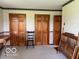 Bedroom with light carpet, paneled doors and vintage style furniture, ready for personalization at 622 S Washington St, Morristown, IN 46161