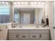 Comfortable bathroom with double sink vanity and tile floors at 6296 Sugar Maple Dr, Zionsville, IN 46077