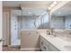 Luxurious bathroom with glass shower, large vanity and modern fixtures at 6296 Sugar Maple Dr, Zionsville, IN 46077