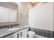 Cozy bathroom featuring granite countertops, shower and vanity storage at 6296 Sugar Maple Dr, Zionsville, IN 46077