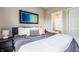 Serene bedroom with a plush bed and a view to a bright bathroom at 6296 Sugar Maple Dr, Zionsville, IN 46077
