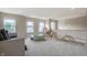 Spacious bonus room featuring lots of light, games and neutral decor at 6296 Sugar Maple Dr, Zionsville, IN 46077