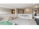 Inviting bonus room area with plenty of shelving and neutral tones at 6296 Sugar Maple Dr, Zionsville, IN 46077