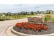 Welcoming community entrance with stone signage and lush landscaping at 6296 Sugar Maple Dr, Zionsville, IN 46077