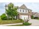 Well-maintained home with a manicured lawn and a two-car garage at 6296 Sugar Maple Dr, Zionsville, IN 46077