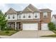 Attractive two-story home with brick and siding, featuring a double garage at 6296 Sugar Maple Dr, Zionsville, IN 46077