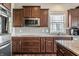 Close up of kitchen with stainless steel appliances, granite countertops, and custom cabinets at 6296 Sugar Maple Dr, Zionsville, IN 46077