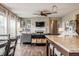 Spacious living room featuring modern decor, a fireplace, and ample natural light at 6296 Sugar Maple Dr, Zionsville, IN 46077