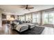 Cozy living room with a large sectional sofa and lots of windows for natural light at 6296 Sugar Maple Dr, Zionsville, IN 46077