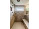 Spacious tile shower featuring rain shower head and bench seating at 6296 Sugar Maple Dr, Zionsville, IN 46077