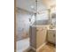 Nicely appointed tile shower featuring glass partition and wall niche at 6296 Sugar Maple Dr, Zionsville, IN 46077