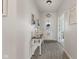 Light and airy foyer features decor, a front door with glass, and vinyl flooring at 632 Albermarle Dr, Pittsboro, IN 46167