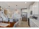 Bright kitchen with stainless steel appliances, marble countertops, and a large island at 632 Albermarle Dr, Pittsboro, IN 46167