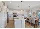 Well-lit kitchen with marble island, stainless steel appliances, and an eat in kitchen area at 632 Albermarle Dr, Pittsboro, IN 46167