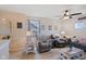 Comfortable living room with plush seating, ceiling fan, and natural light at 632 Albermarle Dr, Pittsboro, IN 46167