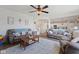 Open-concept living room features comfortable seating and seamless flow into the kitchen at 632 Albermarle Dr, Pittsboro, IN 46167
