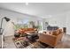 Bright living room with stylish furniture, hardwood floors, and ample seating at 6507 W Whispering Way, Greenfield, IN 46140