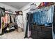 Spacious walk-in closet featuring ample storage space, shelving, and hanging rods for organization at 6507 W Whispering Way, Greenfield, IN 46140