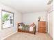 Cozy bedroom featuring a twin bed, dresser, plush carpet, and window offering natural light at 6580 Kings Ct, Avon, IN 46123