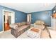 The spacious living room features comfortable seating, stylish decor, and plenty of natural light at 6580 Kings Ct, Avon, IN 46123