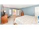 The primary bedroom offers an en suite bathroom, wooden furniture, and plenty of closet space at 6580 Kings Ct, Avon, IN 46123