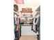 Spacious walk-in closet with shelving and hanging space, perfect for organizing clothes and accessories at 6580 Kings Ct, Avon, IN 46123