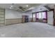 Spacious finished basement featuring a fireplace, carpet, and outside access at 70 Fairground St, Franklin, IN 46131
