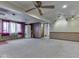 Large finished basement including a ceiling fan and washer/dryer at 70 Fairground St, Franklin, IN 46131