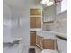 Functional bathroom featuring a walk-in shower and built-in storage at 70 Fairground St, Franklin, IN 46131