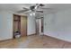 Bedroom featuring hardwood floors, light green walls and a closet at 70 Fairground St, Franklin, IN 46131