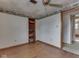 Bedroom with built in shelf and hardwood floors at 70 Fairground St, Franklin, IN 46131