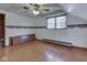 Bedroom featuring hardwood flooring, ceiling fan, and natural light at 70 Fairground St, Franklin, IN 46131