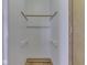 Compact closet boasts a light, wooden rack, and flooring at 70 Fairground St, Franklin, IN 46131