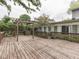 Spacious wooden deck with an attached pergola at 70 Fairground St, Franklin, IN 46131