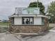 The Johnson County Fairgrounds entrance gate is made of stone and white siding with an event welcome sign at 70 Fairground St, Franklin, IN 46131