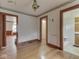 Spacious living room featuring hardwood floors and multiple entrances at 70 Fairground St, Franklin, IN 46131