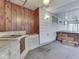 Outdoor patio features hot tub, sink, fan, and lighting at 70 Fairground St, Franklin, IN 46131