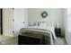 A serene bedroom is highlighted by an antique trunk and a window at 7402 Northfield Blvd, Fishers, IN 46038