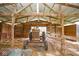 View of the interior of a barn with tractor and hay bales inside at 7447 S 25 E, Pendleton, IN 46064