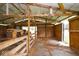 Barn interior features a tractor, wooden fencing, and bright, natural light at 7447 S 25 E, Pendleton, IN 46064