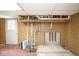 Basement utility area with exposed pipes, wiring, and mechanicals at 7447 S 25 E, Pendleton, IN 46064