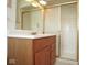 Bathroom boasts a shower, and a single sink vanity with decorative lighting at 7447 S 25 E, Pendleton, IN 46064