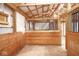 Inside a horse stall featuring wood construction with metal bars and a dirt floor at 7447 S 25 E, Pendleton, IN 46064