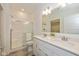 Modern bathroom with double vanity, quartz countertops, and walk-in shower at 794 Harley Ln, Westfield, IN 46074