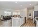 Bright, open kitchen that flows into the living and dining areas. Featuring modern design at 794 Harley Ln, Westfield, IN 46074