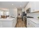 Well-equipped kitchen with modern appliances, quartz countertops, and ample storage at 794 Harley Ln, Westfield, IN 46074