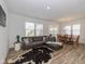 Spacious living room with a cozy sofa that connects to a dining area at 794 Harley Ln, Westfield, IN 46074
